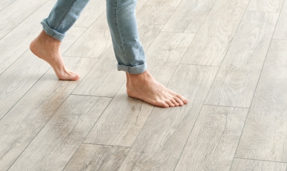 barefoot walking on wood floor